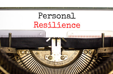 Personal resilience symbol. Concept word Personal resilience typed on retro old typewriter. Beautiful white background. Business psychological and personal resilience concept. Copy space.