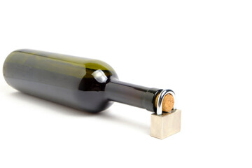 Bottle wine and lock on neck, white background, concept of ban on drinking.
