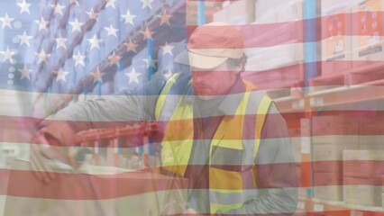 Animation of flag of usa over caucasian male worker in warehouse - Powered by Adobe
