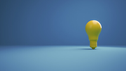 Yellow Lightbulb on a blue background. Horizontal composition with negative space on the left. Concept of Creativity and innovation.