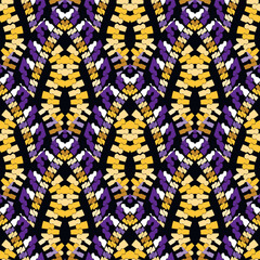 Tribal ethnic style modern seamless pattern. Colorful ornamental zippers background in black yellow violet colors. Repeat decorative backdrop. Textured curved ornaments with golden zippers, shapes