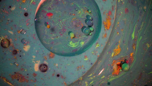 Colorful bubbles abstract paint oil milk experiment muted rainbow