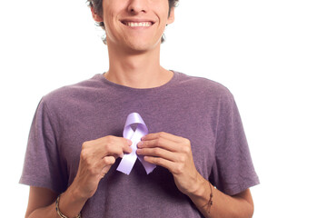 Unrecognizable man holding purple ribbon, world cancer day february 4th. Awareness concept