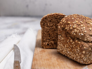 Freshly baked bread on grey concrete background. 