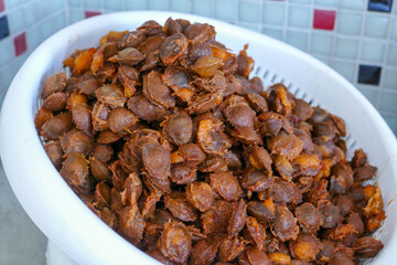 apricot kernels, apricot kernels in pharmaceutical production, a large amount of close-up apricot kernels,