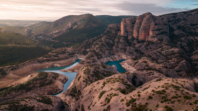 Aerial photography taken from a drone in the Vadiello reservoir in the province of Huesca, Aragon, in which you can see the Vadiello mallos in the Sierra de Guara. Spain