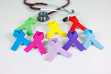 Colorful ribbons and stethoscope, cancer awareness, World cancer day