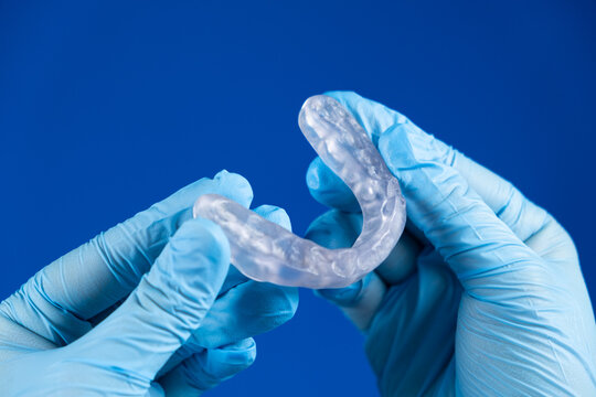 Dental transparent plastic mouthguard, splint for the treatment of dysfunction of the temporomandibular joints, bruxism, malocclusion, to relax the muscles of the jaw.
