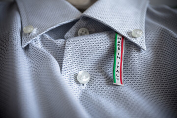 Made in Italy label on white cotton shirt