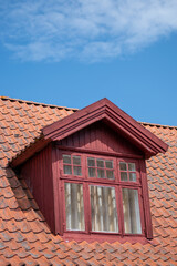 red roof of the house  and window