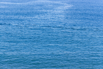 Sea surface water wave pattern in blue color