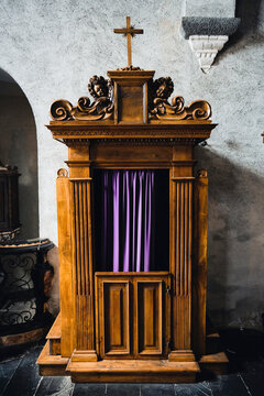 Old wooden confession booth at a church