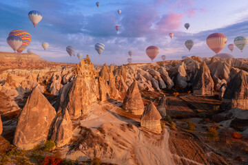 Aerial top view landscape Cappadocia stone and old cave house in Goreme national park Turkey Sunset sunlight