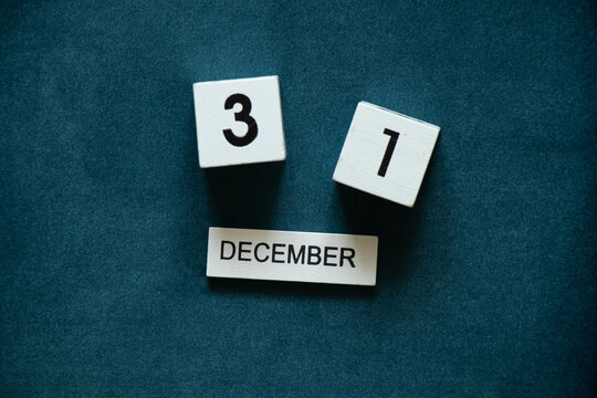 December 31 from the cubes lie on a blue background, the date of the new year and the calendar, the date of the holiday