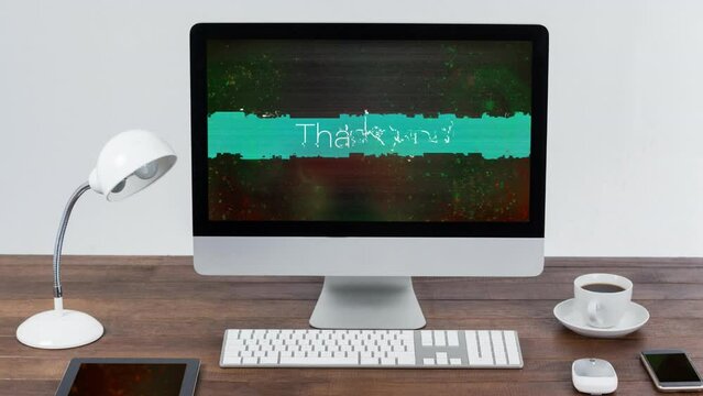 Animation of thank you text and interference on computer