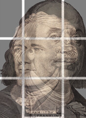 Double exposure of portrait of U.S. presidents Benjamin Franklin and Alexander Hamilton.