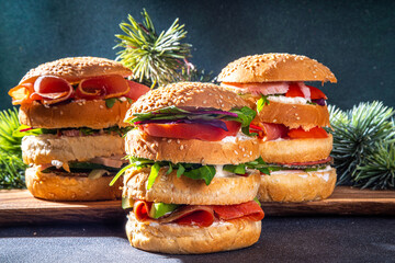 Christmas panettone gastronomico. Pan Brioche salato Panettone gastronomico Italian Christmas, New Year antipasto appetizer sandwiches, with sausage, meat, cheese, olives, salmon fish