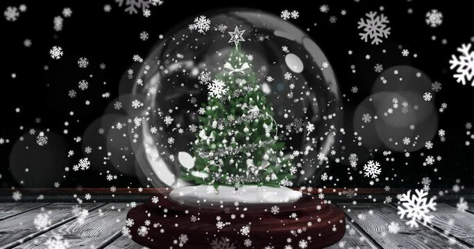 Animation of snowflakes over shooting star and snow ball on black background