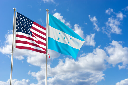 United States of America and Republic of Honduras flags over blue sky background. 3D illustration