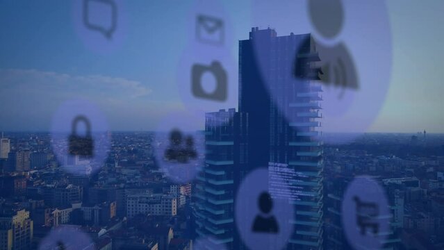 Animation of multiple digital icons and data processing against aerial view of cityscape