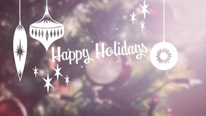Animation of happy holidays text banner and hanging decorations over decorated christmas tree
