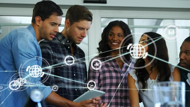 Animation of network of digital icons over diverse colleagues discussing together at office
