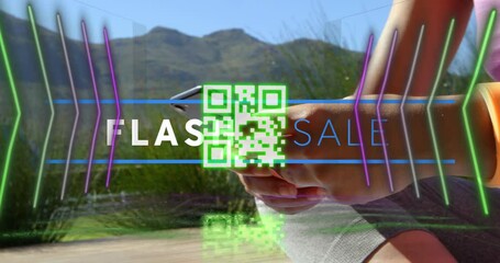Animation of flash sale text and qr code over caucasian woman using smartphone - Powered by Adobe