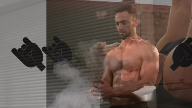 Animation of fist icons over caucasian strongmen at gym
