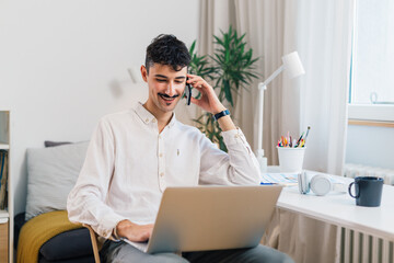 Young businessman is having a phone call