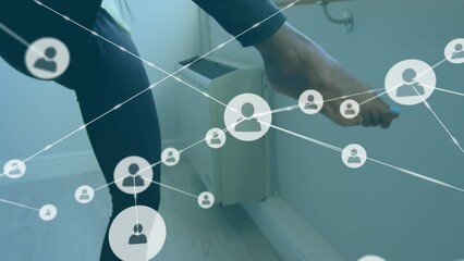 Animation of network of connections with icons over african american female dancer - Powered by Adobe