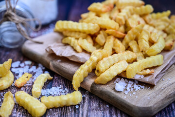  Home made   organic   Fresh fried French fries with ketchup sauce  on wooden background