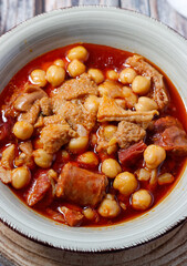 Caloric dish of traditional Spanish cuisine. Winter food. Madrid style tripe stew.(Callos a la madrileña)