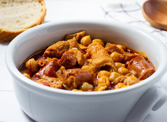 Close-up of tripe casserole with chickpeas. Winter comfort food. (Callos a la madrileña)