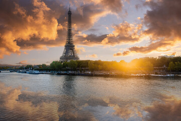 Fototapeta na wymiar View of Eiffel Tower and river Seine at sunrise in Paris, France