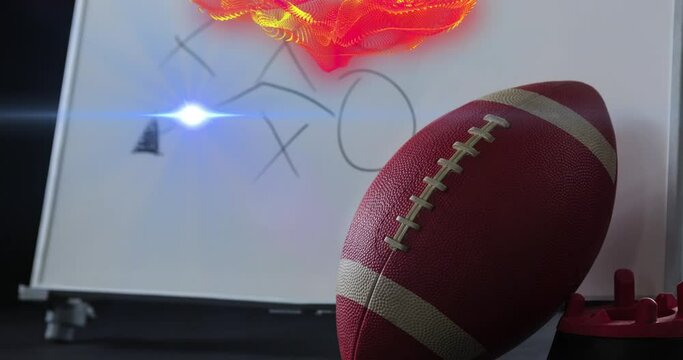 Animation of lens flare, abstract pattern over rugby ball, water sipper and game plan on white board
