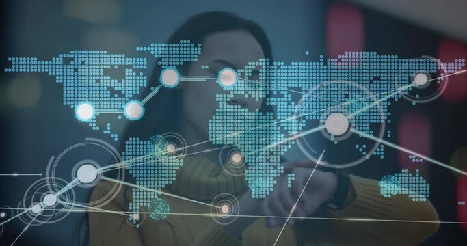 Animation of network of connections with world map over biracial woman using smartwatch - Powered by Adobe