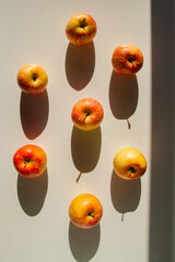 Set of apples. Apples are yellow-red. Hard light.