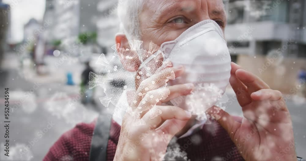 Wall mural Animation of covid 19 cells over caucasian man wearing face mask