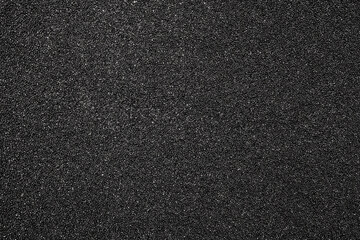 The texture of dense black foam rubber.The background of the foam is black.The substrate is made of black foam rubber. - obrazy, fototapety, plakaty