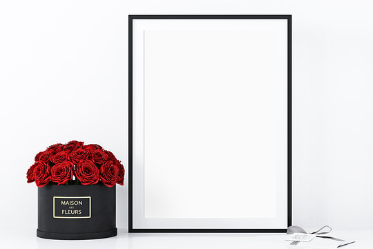 Black frame mockup and red rose