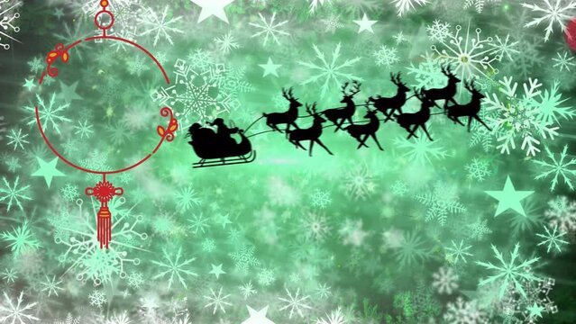 Animation of red dream catcher over snowflake and santa riding sleigh against abstract background