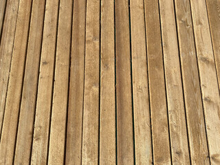 Vertical natural boards wooden brown with seams. Background, texture