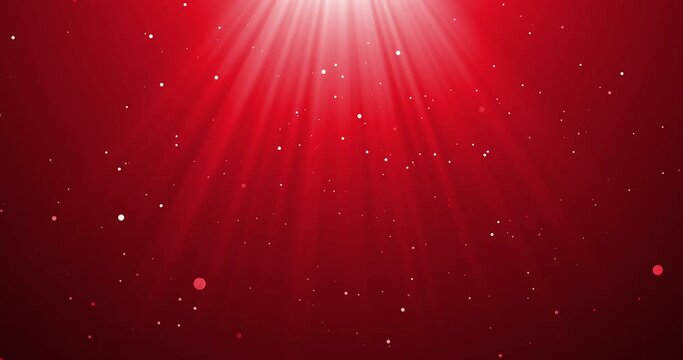 Animation of falling confetti and light rays over red background