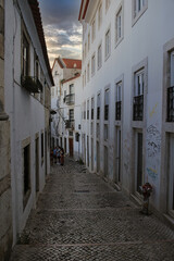 Narrow street of the Alfama district in Lisbon, Portugal