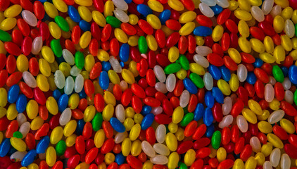 Fototapeta na wymiar colorful oval glossy sugar candies