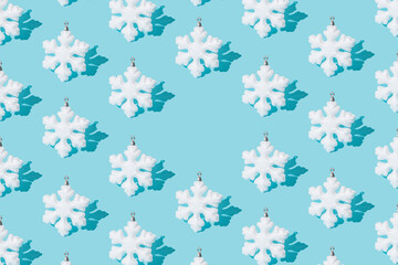 Snowflake on ablue background. Pattern. Minimal design. Copy space.