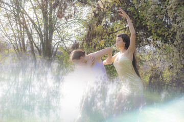 women in nature dancing