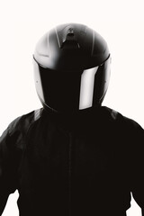 Portrait of a motorcycle rider posing with a black helmet on a white background. - 552455328