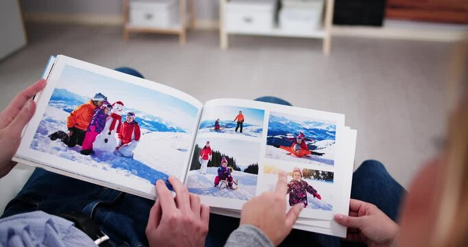 Couple Family Looking Photo Album