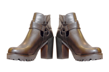 Black high-heeled womanish boots taken closeup. Isolated.